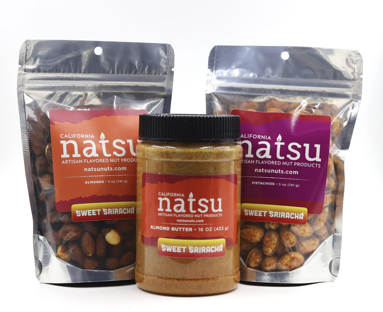 Natsu 4 A group of nuts and a jar on top of a table.