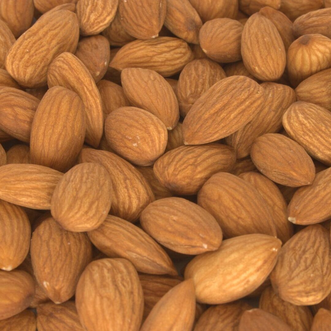 A close up of almonds in the shell